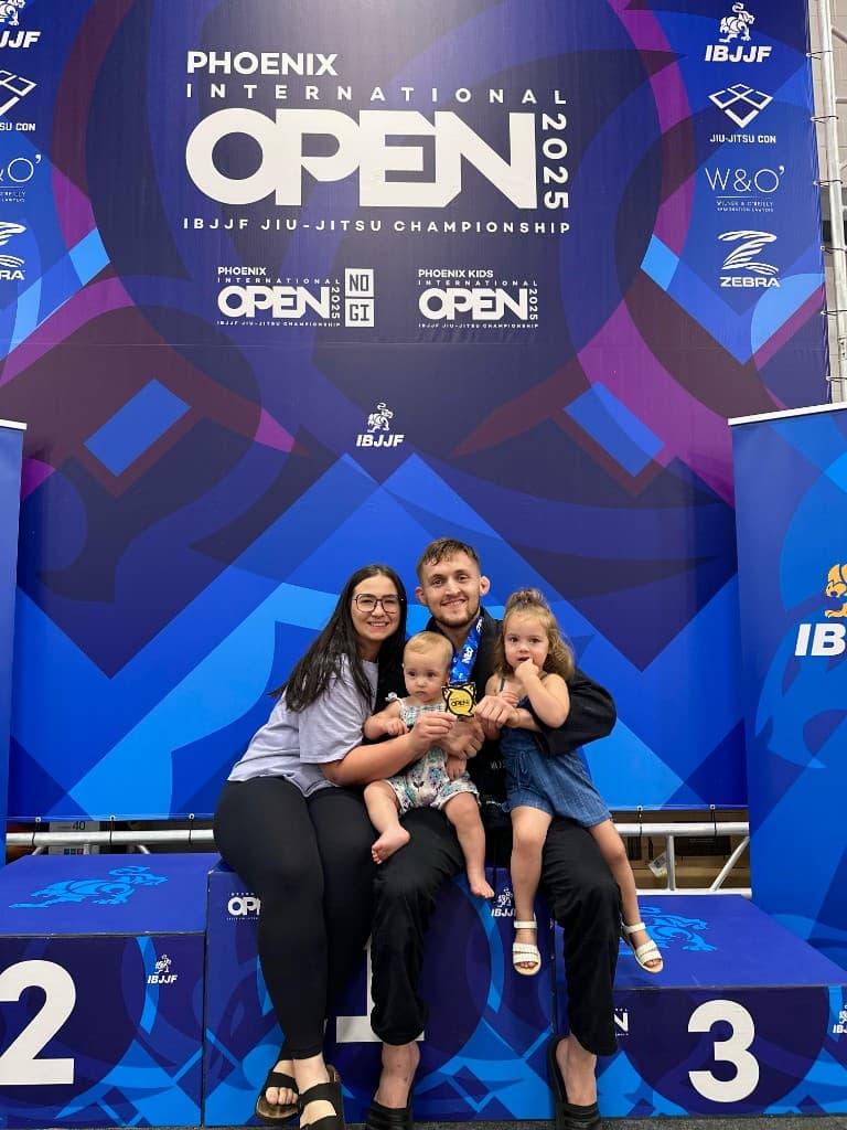 Celebrating with family on the podium